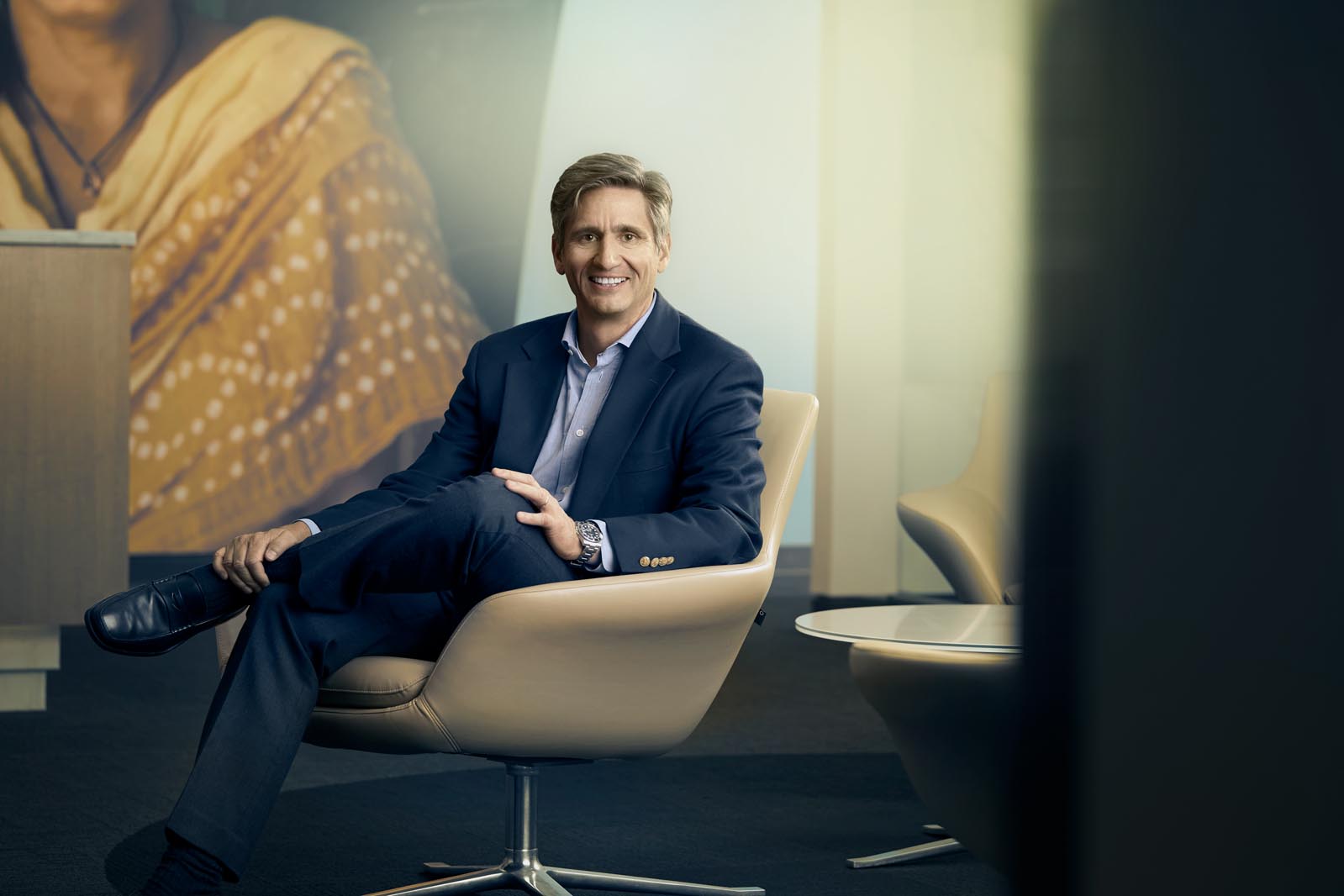 Portrait of man in chair after retouching