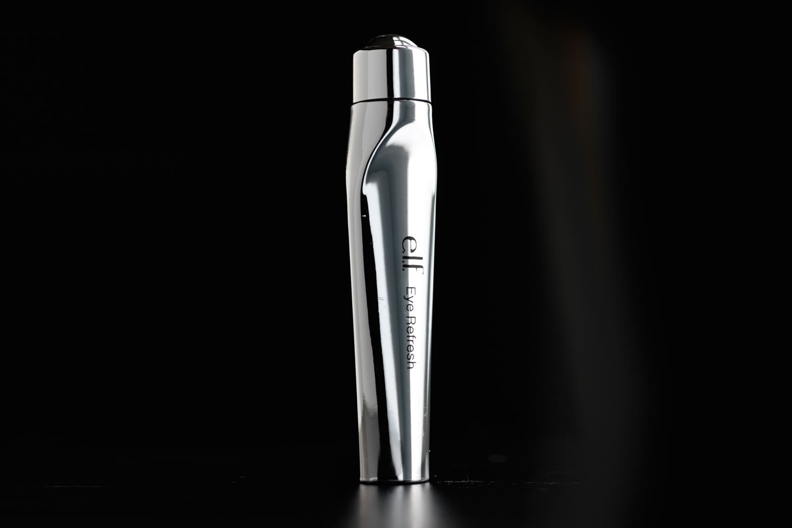A bottle of elf beauty product before retouching
