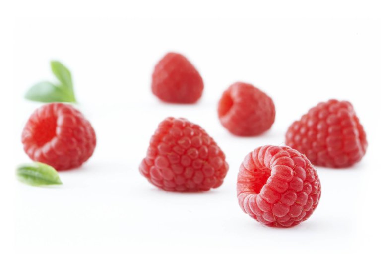 Raspberries on white background