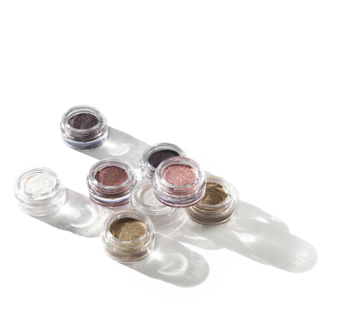 Small cometics makeup arranged on a white background - Cosmetics photography