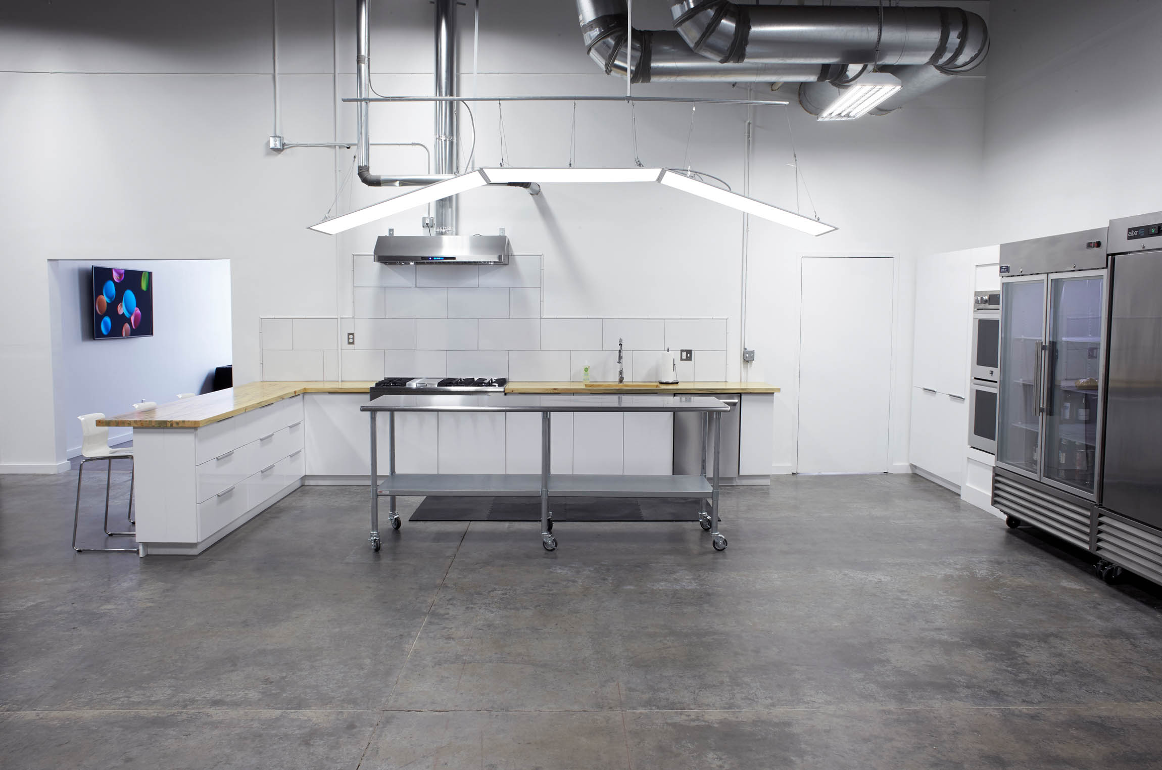an alternate view of modern kitchen of OMS Photo's Golden Colorado photo studio